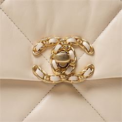 Chanel - ‘19’ Medium Flap Bag, the model introduced in 2019 as one of the final designs associated with Karl Lagerfeld, in cream quilted lambskin leather with mixed gold, silver and ruthenium-tone chain strap and signature CC monogram turn-lock fastening, unused with original dust bag and box