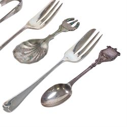 Silver dessert spoon, silver souvenir spoon, silver handled fish knife and two silver napkin rings, together with a collection of silver plated cutlery