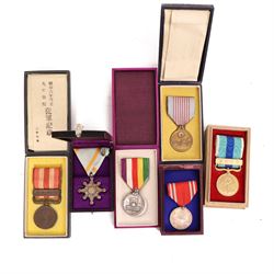 Six Japanese medals, including Order of the Sacred treasure, Red Cross medal, Showa Enthro...