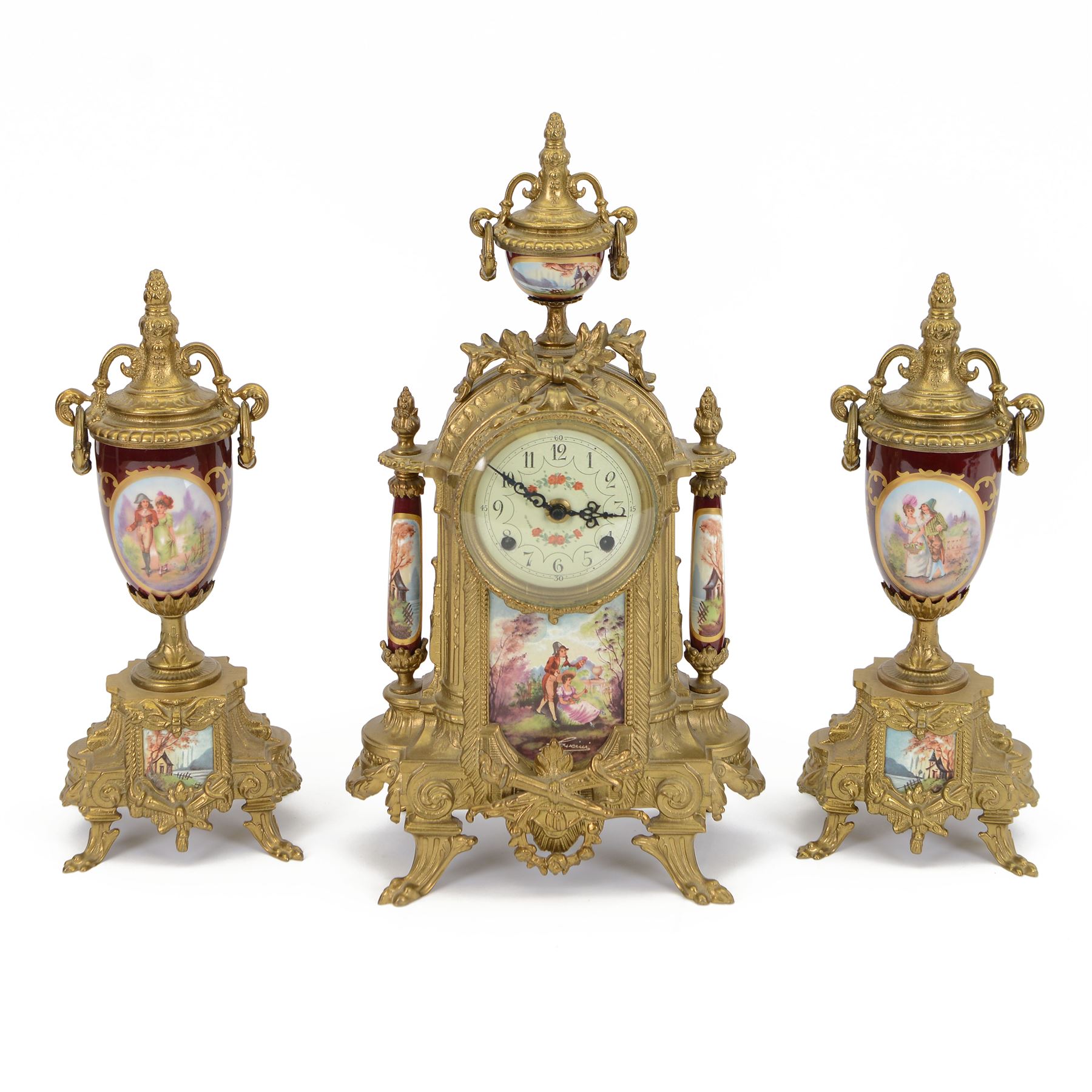 Continental-20th century clock garni in a mid 19th century style case, with porcelain panels and dial, spring driven two train movement with a floating balance escapement, striking the hours and half hours on two bells. With conforming urns. 