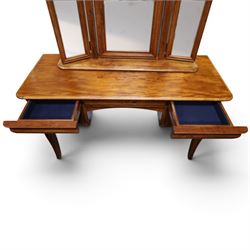 Willis & Gambier - mahogany dressing table, three part mirror and stool, the dressing table with rectangular top with chamfered corners, over two baize lined frieze drawers, kneehole recess and a single drawer either side, three part mirror with central tilting mirror on a moulded plinth base, with oval beige padded stool 