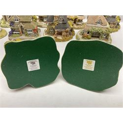 Eight Lilliput Lane limited edition Beatrix Potter models, including Buckle Yeat, Tabitha Twitchits Shop and Ginger Pickles Shop, together with twelve Lilliput Lane models from the Blaise Hamlet collection, including Dial Cottage, Diamond Cottage and Vine Cottage, all with deeds and original boxes (20)