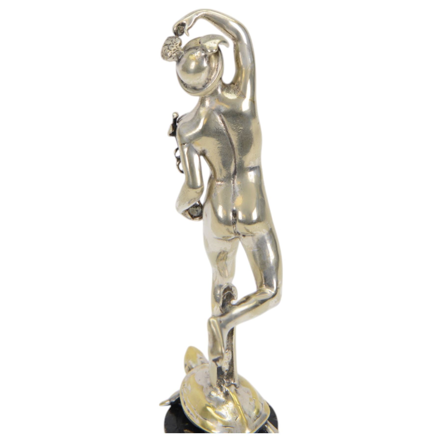 Mercury chrome car mascot upon a stepped circular base, H25cm 