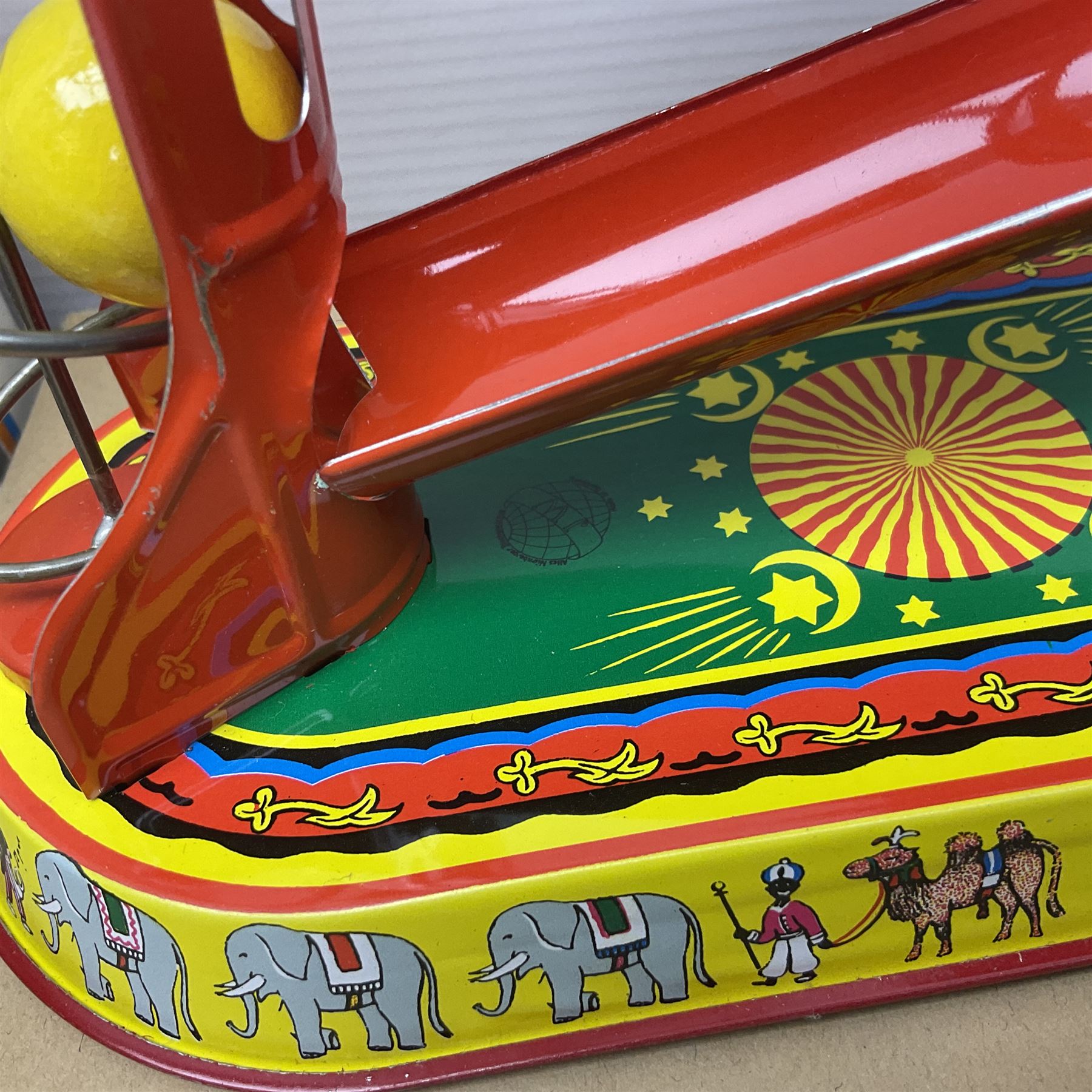 Twenty six tinplate models to include Ferris Wheel and Performing Circus Elephant, marked JW, further similar examples such as Duck on a Bike, Clown on Roller, Carousel; Popeye Tin Speedboat; Looney Tunes Wind Up Cars and Express Train; various international examples, MS107 Jumping Bambi, Pop Pop Boat, jumping frogs, pecking chickens etc; both boxed and loose