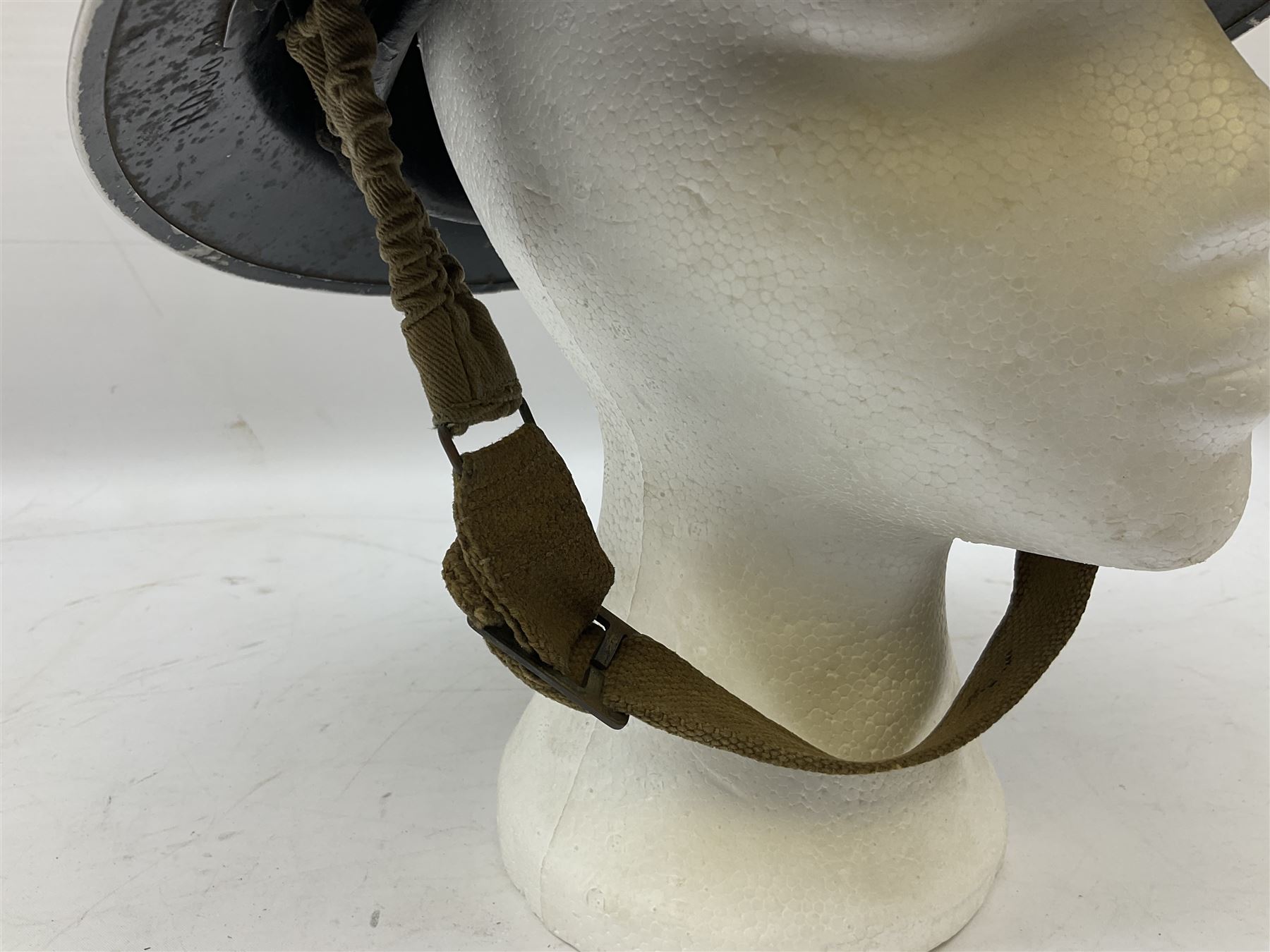 WW2 Home Front 'Police' black painted steel helmet with original liner and webbing chin strap, impressed R.O. Co. 1/1939; and re-painted shell only for WW2 Wardens steel helmet impressed AMC II 1941 C676 (2)