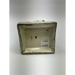 Late 18th century Prattware figure representing Charity, modelled as a mother with baby in her arms and two small children clutching at her robes, upon a square base, overall H21cm.