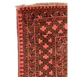 Turkman Bokhara red ground rug, four Gul motifs enclosed by multiple geometric patterned border bands