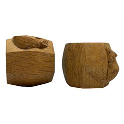 Mouseman - pair oak napkin rings, faceted bulbous form carved with mouse signature, by the workshop of Robert Thompson, Kilburn, H5cm 
