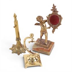 Collection of brass watch stands, including an example modelled as a cherub upon an onyx base, tallest H17cm  