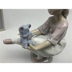 Three Lladro figures, comprising Best Friends, no 7620, Little Friskies, no 5032 and Playful Friends, no 5609, two with original boxes, largest example H18cm