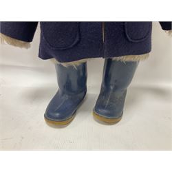 Pair of Paddington Bear teddies with amber eyes, the first example having a brown felt hat, red coat and blue PB boots with original label; the second having a grey felt hat, blue coat and blue Dunlop boots, tallest H51cm 