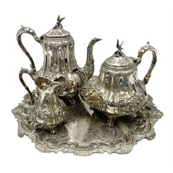 Victorian four piece silver plated tea service, comprising teapot, coffee pot, milk jug, decorated in relief with, scrolls and foliage, the tea and coffee pots with bird finial and and ivory insulators, upon a circular salver, salver D43cm
This item has been registered for sale under Section 10 of the APHA Ivory Act