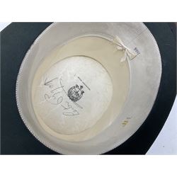 Leather hat box containing black felt top hat with 'British Manufacture' label, together with a grey top hat with 'Allens of Harrogate' label 