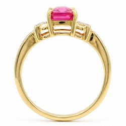 18ct gold pink pink spinel and diamond ring, single emerald cut spinel of approx 1.85 carat, with a round brilliant cut diamond set either side and diamond set shoulders, Birmingham assay mark