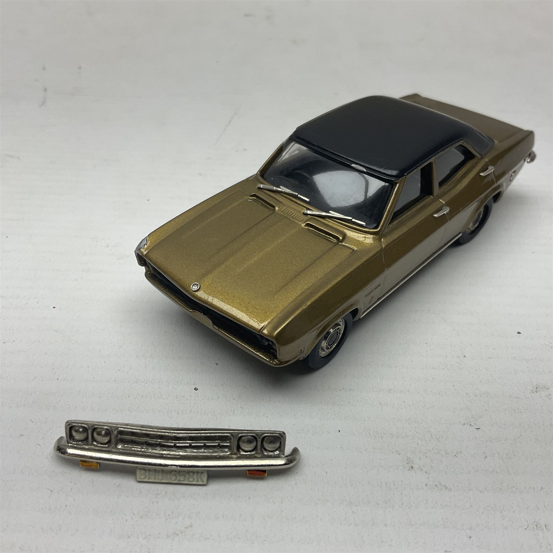 Four Lansdowne Models 1:43 scale models - 1956 Hillman minx Series 1 (Pearl grey over Fiesta blue); 1957 Hillman Husky Series 1 (Seacrest green/foam grey); 1960 Ford Consul MkII (Imperial maroon/smoke grey); and 1972 Vauxhall Ventora 3300 MkII; all boxed (4)