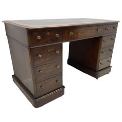 Victorian mahogany twin pedestal desk, rectangular top with inset ebonised leather writing surface, fitted with nine graduating drawers with brass pull handles, on plinth bases