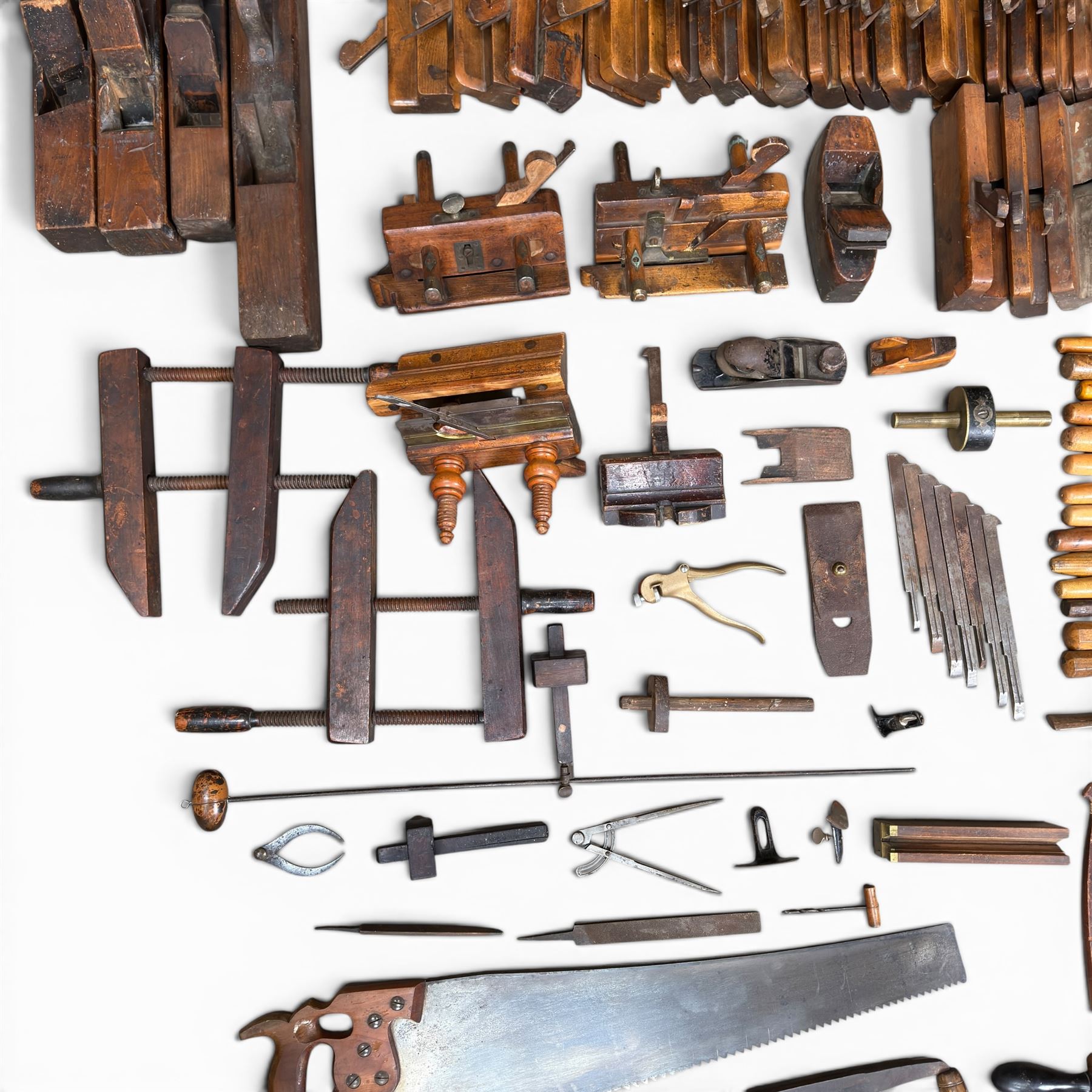 Collection of planes and woodworking tools including wood planes, chisels, hammers etc along with three books (Antique Woodworking Tools, Timber Preservation and Woodworkers Pocket Book)