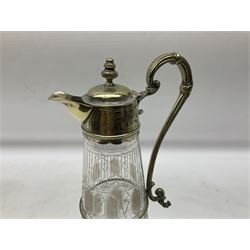 Late 19th century cut glass and silver plated mounted claret jug, the body of tapering form heavily decorated, with star cut base, H31cm, together with another later silver-plate mounted claret jug