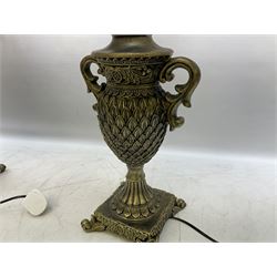 Pair bronzed amphora lamps with pineapple decoration, scroll handles and foliate base with scrolled feet together with pair peach ground shades and raised floral pattern H76cm (2)