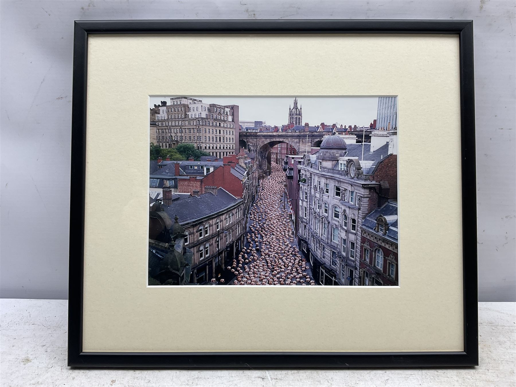 Spencer Tunick (American 1967-): 'Naked on the Tyne', colour photograph, signed titled and dated 2005 verso 18cm x 24cm