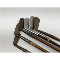 Golf - three early 20th century hickory shafted irons marked R. Simpson, Harrods Ltd etc; child's wooden shafted putter; two transitional wood grain steel shafted irons, one marked Tom Morris; and set of four Macgregor Tommy Armour woods (10)