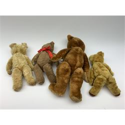 Four 1950s English teddy bears including a Chad Valley brown alpaca wool bear with swivel jointed head, glass type eyes, vertically stitched nose and mouth and jointed limbs H15