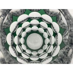 Val St Lambert style glass vase of shouldered ovoid form, cased in deep green over clear and heavily cut with repeat spherical pattern, indistinctly signed beneath ('Jac E. Dalmley'?), H15cm