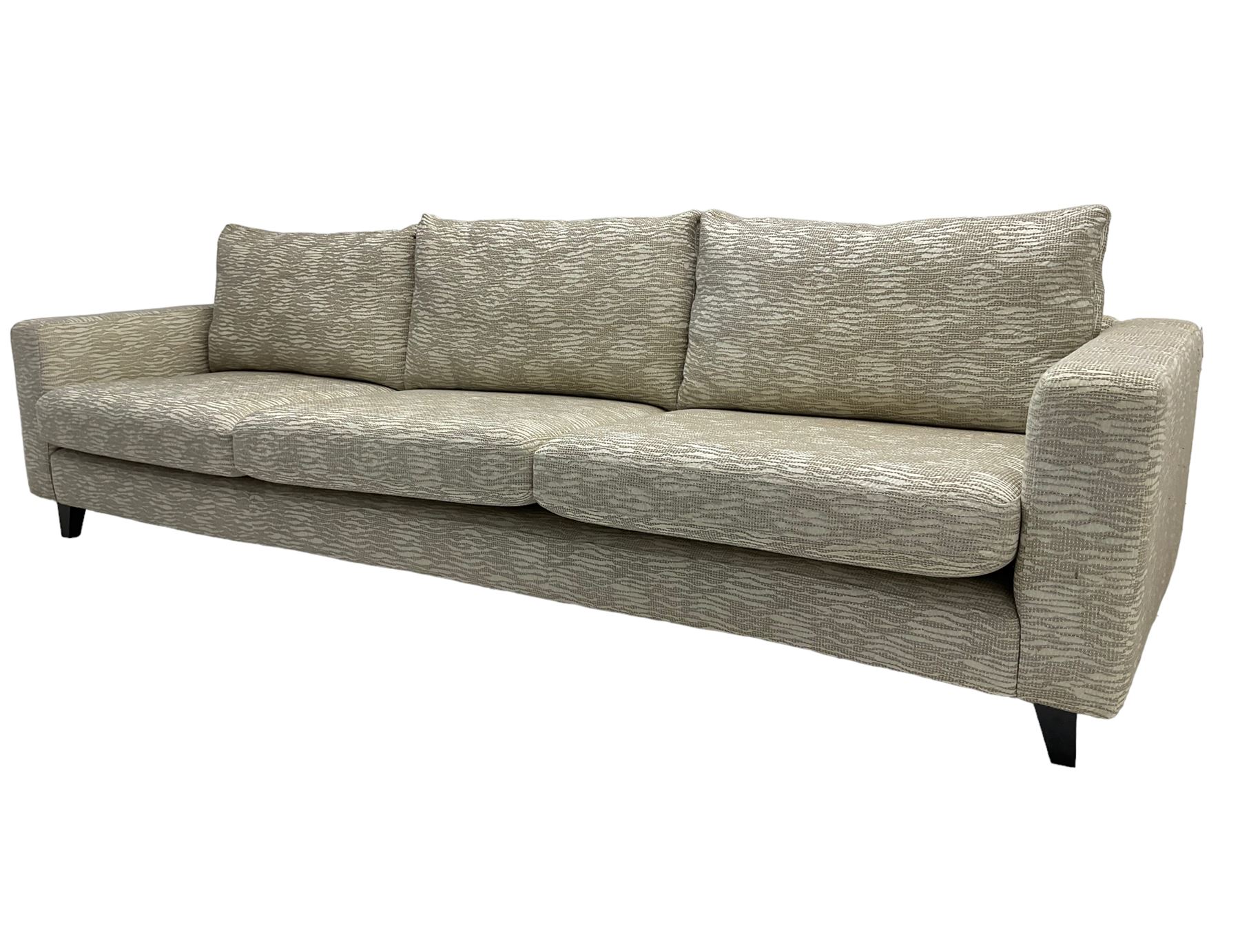 Orior - contemporary large three seat sofa, upholstered in patterned textured fabric on ebonised splayed feet