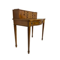 Georgian design yew wood serpentine writing desk, fitted with raised correspondence drawers and two pigeonholes, inset leather writing surface over two drawers, raised on square tapering supports with spade feet