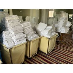 314 white linen King sheets, 138 single duvets covers and other, with three linen trolleys- LOT SUBJECT TO VAT ON THE HAMMER PRICE - To be collected by appointment from The Ambassador Hotel, 36-38 Esplanade, Scarborough YO11 2AY. ALL GOODS MUST BE REMOVED BY WEDNESDAY 15TH JUNE.