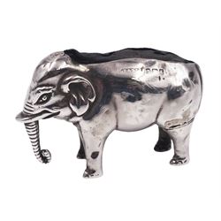 Edwardian silver novelty pin cushion, modelled as an elephant with cushioned back, hallmarked Birmingham 1906, maker's mark indistinct, H3.2cm, approximate total weight 0.46 ozt (14.1 grams)