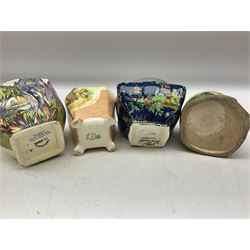 Collection of Japanese Maruhon ware novelty preserve pots, to include examples modelled as a windmill and cottages, together with other 1920s and 30s Art Deco style preserve pots, etc