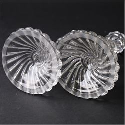 Pair of Baccarat Bambous glass candlesticks, with wrythen moulding, marked beneath, H19cm
