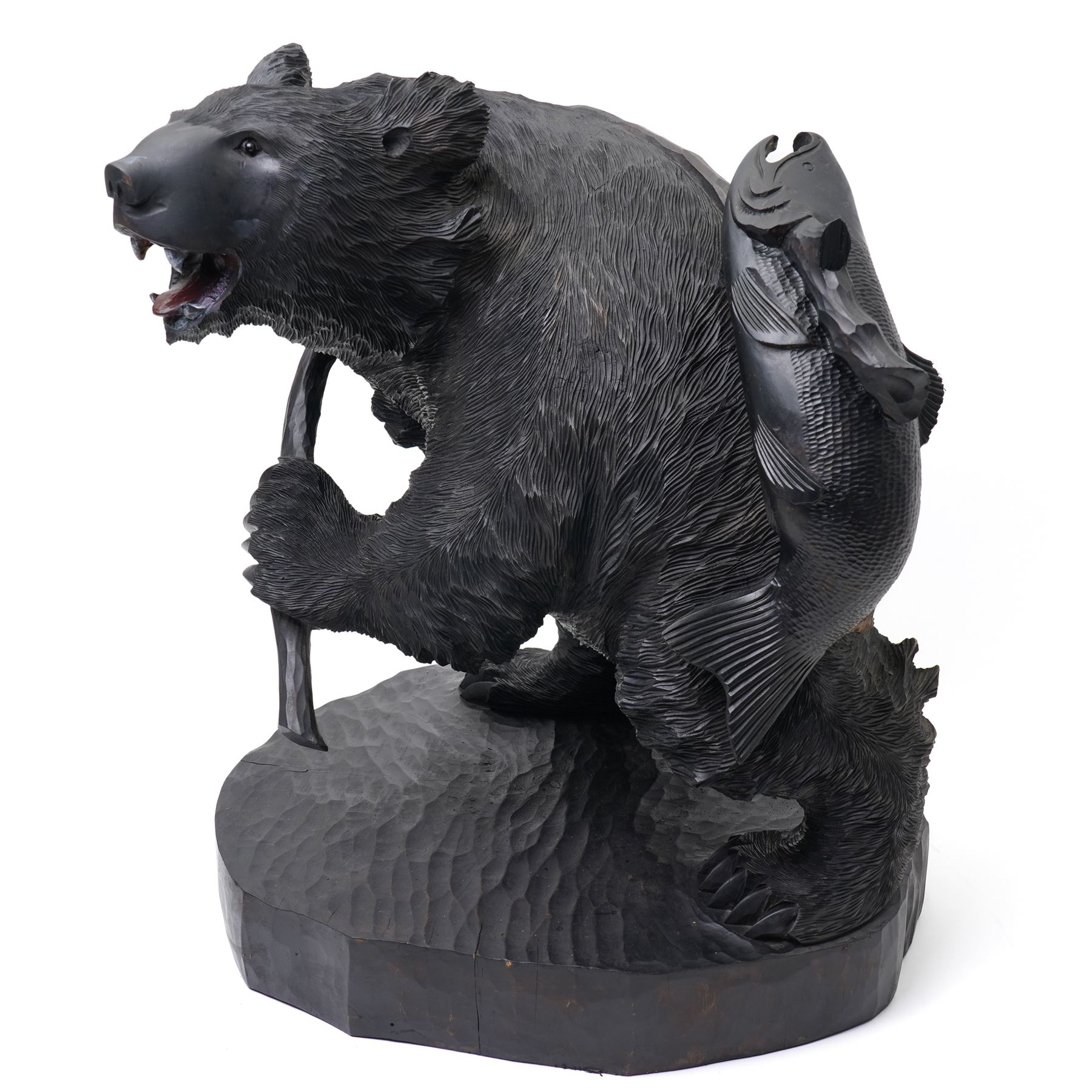 Large Black Forest style carved bear with a fish H50cm
