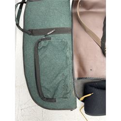 Collection of gun slips, including BSA guns and napier examples and leather 12-bore cartridge belt 