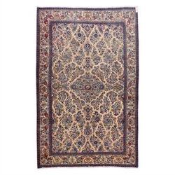 Central Persian Nain hand-knotted rug, ivory ground decorated with a central lobbed medall...