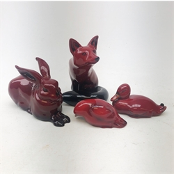  A group of four Royal Doulton Flambe animals, comprising a fox, a rabbit (a/f), a duck, and a further bird, each with printed mark to base, fox H10.5cm,   