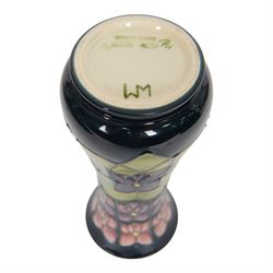 Moorcroft vase Violets pattern, of slender fluted form, with original box H21cm