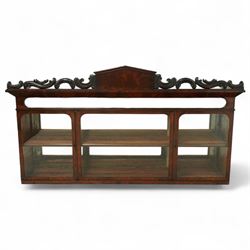 19th century mahogany hanging cabinet, the projecting cornice above a pierced scroll carve...