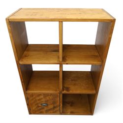 Indigo Furniture - rustic oak shelving unit with cupboard, five open shelves with a cupboard to the lower left, metal cup handles