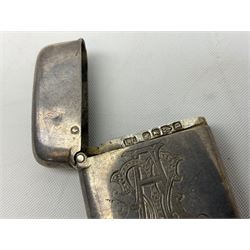 Victorian novelty brass vesta case modelled in the form of a pig holding a money bag, together with a silver vesta, hallmarked 