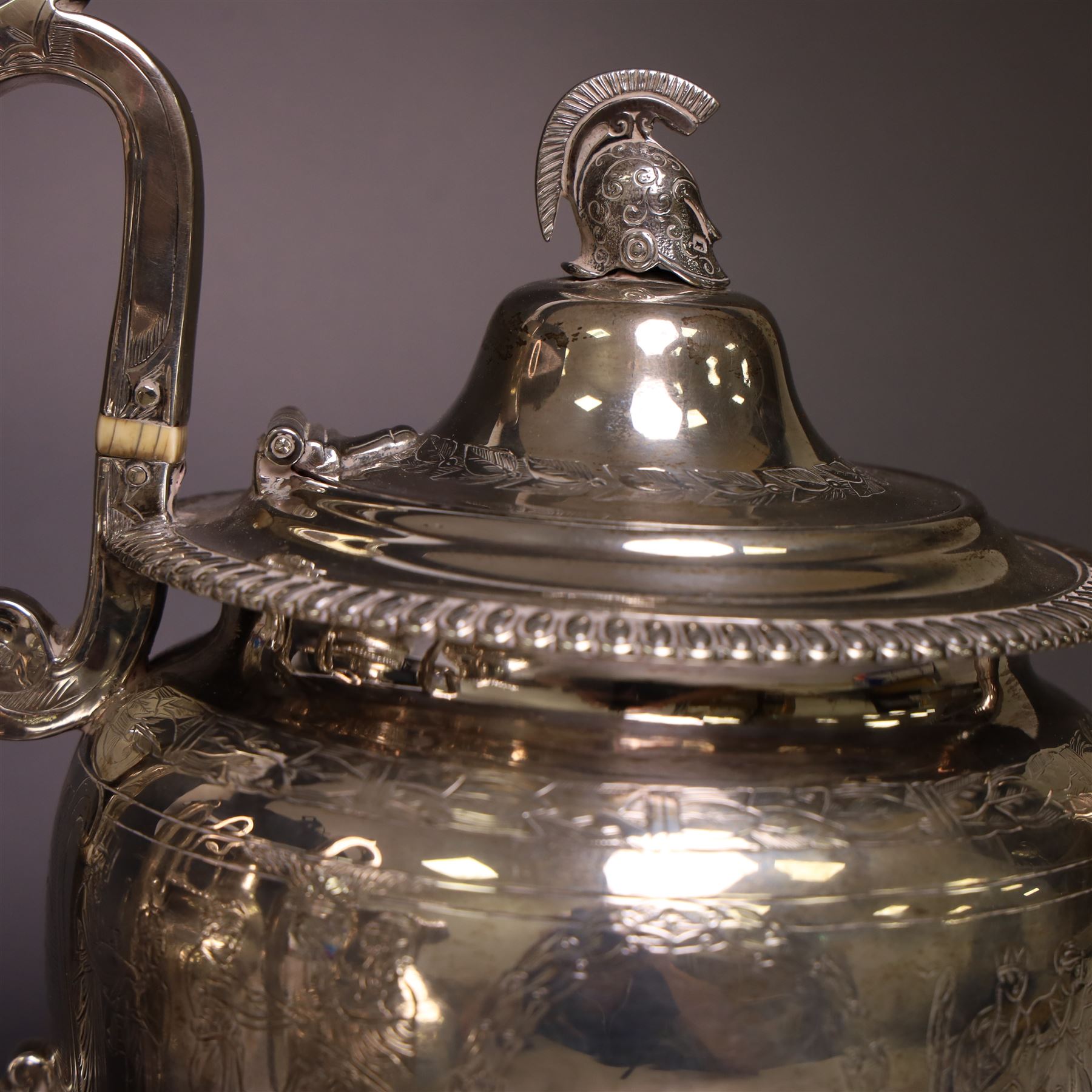 Victorian four piece silver tea service, comprising teapot, hot water pot, open sucrier and cream jug, each of baluster form and decorated with a frieze of neo-classical figures on a textured ground, the teapot and hot water pot with Roman helmet finials and ivory insulated handles, Roberts & Belk, Sheffield 1872, tallest including handle H32cm
This item has been registered for sale under Section 10 of the APHA Ivory Act