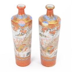 Pair of Japanese Meiji period Kutani vases of slender tapering form, decorated with a bird amongst flowers and trees, each with character marks beneath, H22cm 