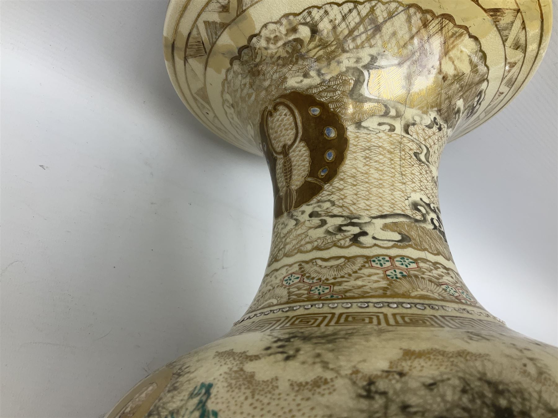 Pair early 20th Century Japanese floor vases of ovoid form, painted with warriors and elders within geometric designs and gilding, H61cm