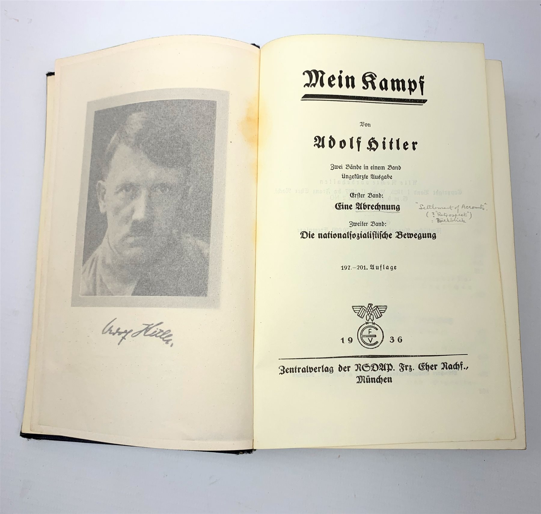 WW2 Kreigsmarine uniform accessories from prisoner of war U-boat Kapitanleutnant Gunther Lorenz comprising cap badge, pair of epaulettes, thirteen buttons marked 1940 and roll of rank braiding and stars; together with copy of Adolf Hitler's Mein Kampf. 1936 published by Zentralverlag Der NSDAP Munchen with German text.