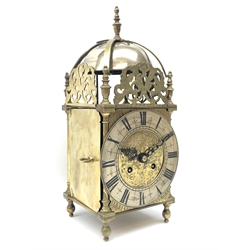  Late Victorian brass Lantern clock with chromed bell, pierced frets, urn finials and silvered Roman dial, the twin train movement stamped L1 196106 quarter striking the hours on a bell, with key, H40cm   