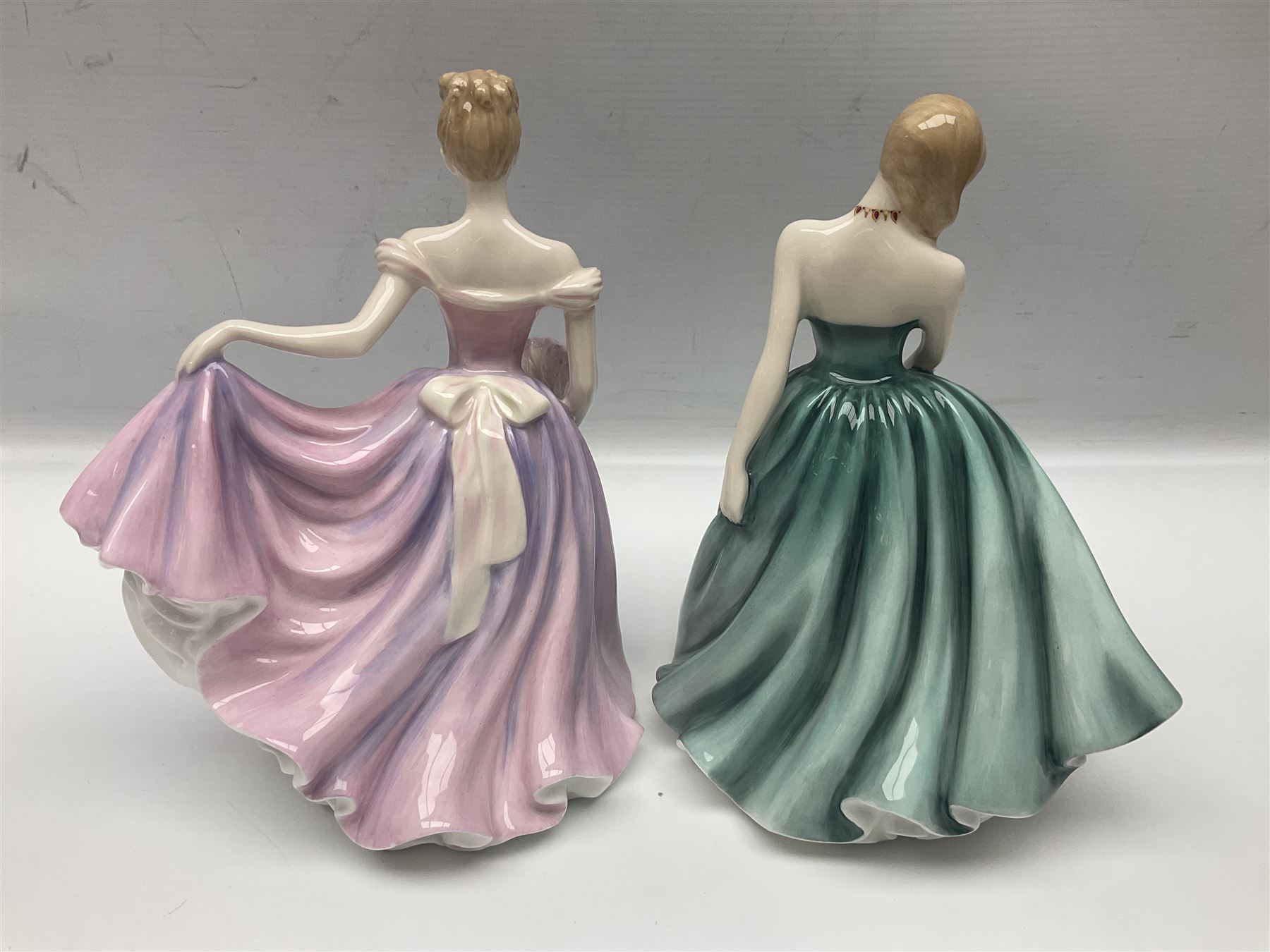 Six Royal Doulton figures, comprising Romance HN2430, Sarah HN3978, Rachel HN3976, Patricia HN3365, Elizabeth HN4426 and Reverie HN2306, all with printed mark beneath  