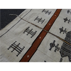  Sudanese woven camel hair and wool wall hanging with stylized motif on cream ground, 235cm x 132cm approx. Provenance:bought by the vendor in 1969 in Nyala, Northern Sudan and believed to have been woven by prisoners   