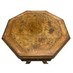 Mid-20th century figured walnut Italian design centre table, octagonal quarter veneered top with cross banding and moulded edge, the skirt decorated with scrolling foliage gilt metal mounts, on turned pedestal mounted with gilt acanthus leaves, quadruple splayed supports with further acanthus leaf decoration