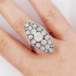 19th century 18ct gold and silver diamond marquise shaped cluster ring, the principal old cut cushion cut diamond of 1.15 carat, in a six claw setting, with pave set old cut diamond surround of 3.28 carat, pierced scroll design gallery and fleur-de-lis shoulders, French (Paris) import mark, total diamond weight 4.43 carat, with IGI report